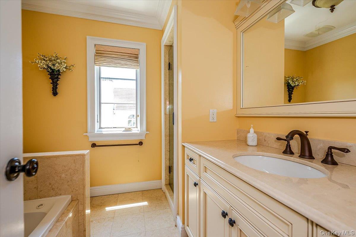 83 Ithaca Avenue Atlantic Beach, NY 11509 - Photo 32 of 45 Full bathroom featuring Jacuzzi Tub/Separate shower & vanity