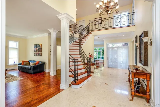 a view of a livingroom with furniture and a flat screen tv