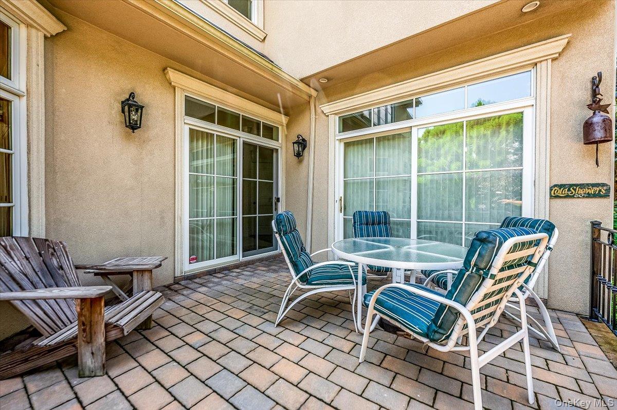 83 Ithaca Avenue Atlantic Beach, NY 11509 - Photo 44 of 45 View of patio / terrace featuring outdoor dining space