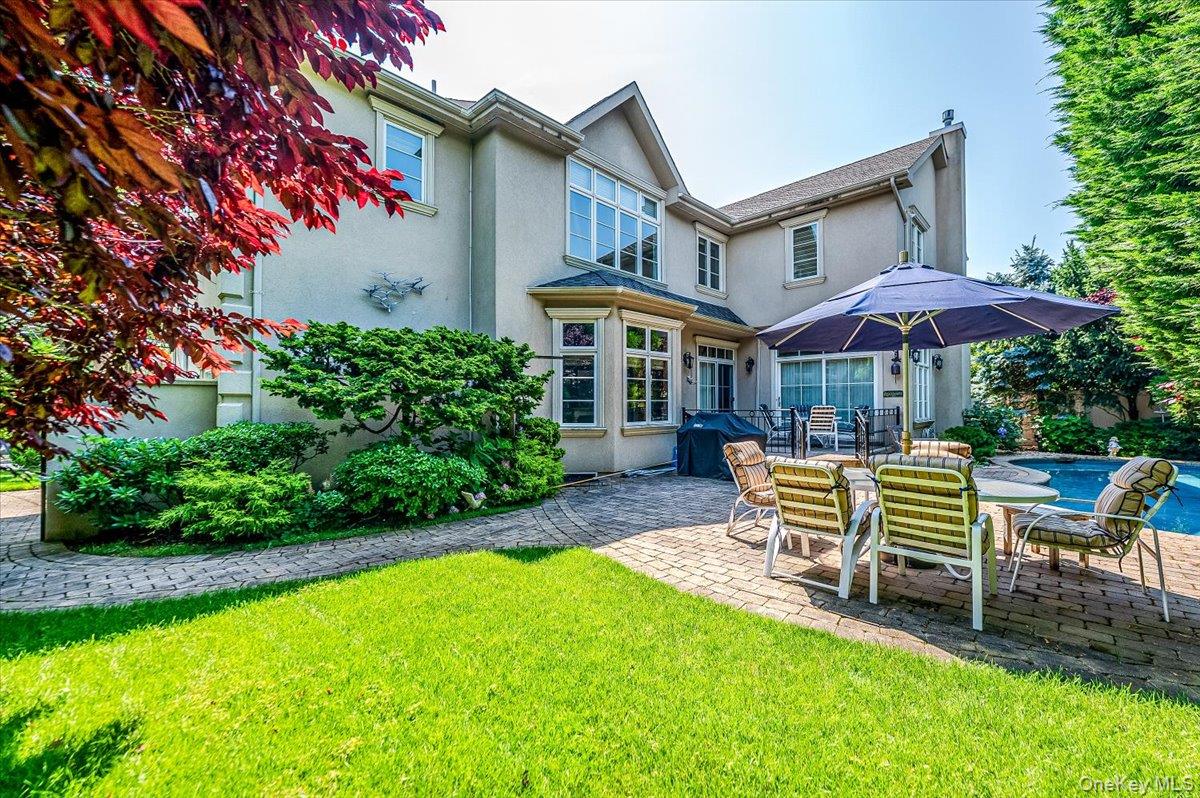 83 Ithaca Avenue Atlantic Beach, NY 11509 - Photo 45 of 45 Back of house , patio area, and lawn