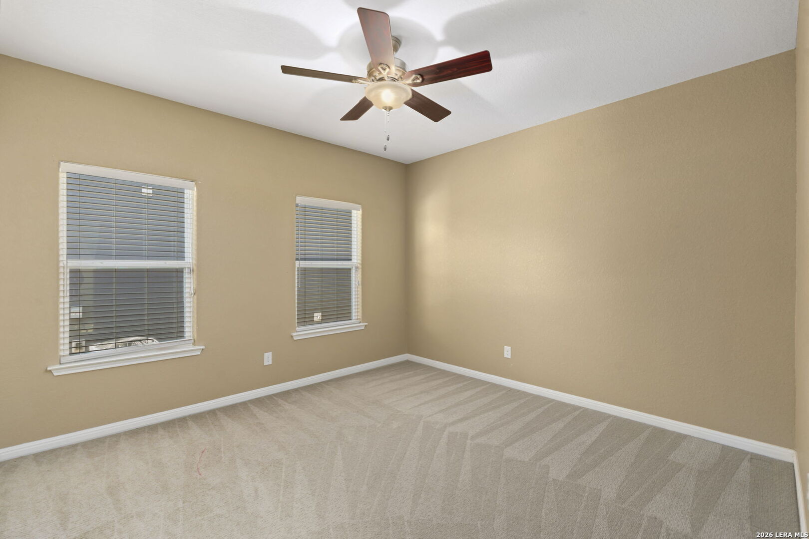 162 Lost Maples Way Marion, TX 78124 - Photo 12 of 18 a view of an empty room with a window