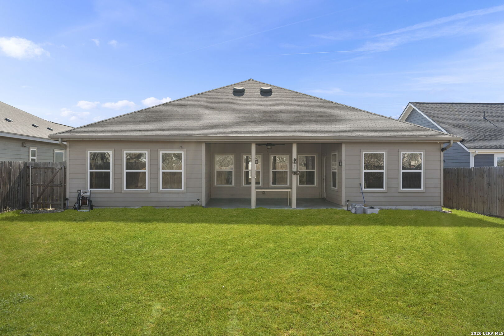 162 Lost Maples Way Marion, TX 78124 - Photo 18 of 18 a backyard of a house with large trees and plants