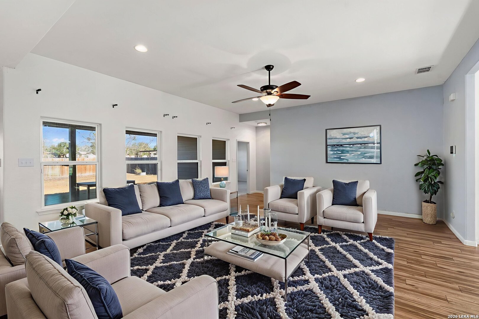 162 Lost Maples Way Marion, TX 78124 - Photo 3 of 18 a living room with furniture and a wooden floor