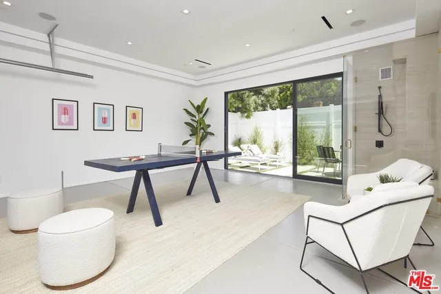 a bathroom with a sink and a shower