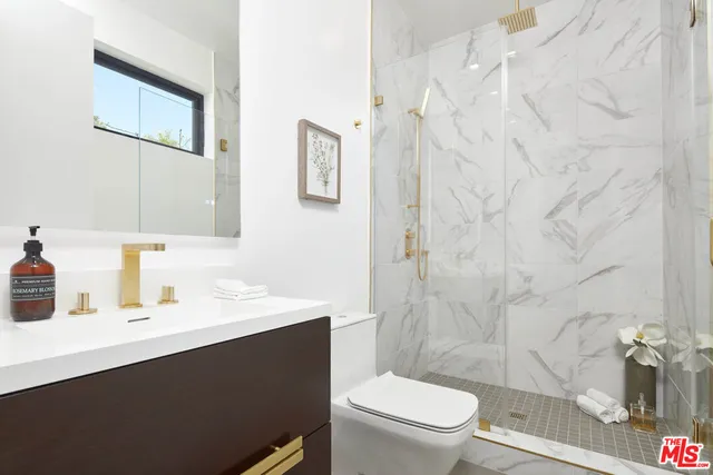 a room with furniture and wooden floor