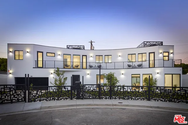 a city street lined with tall buildings