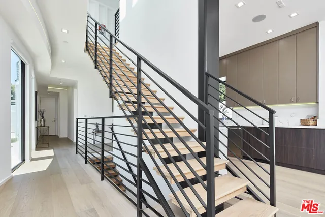 a workspace with furniture and a potted plant