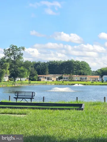 a view of a swimming pool and an outdoor space