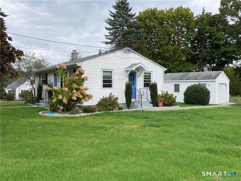 50 Short Beach Road Branford, CT 06405 - Photo 3 of 15 a view of a house with a backyard