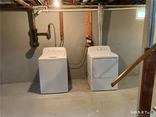 a utility room with dryer and washer