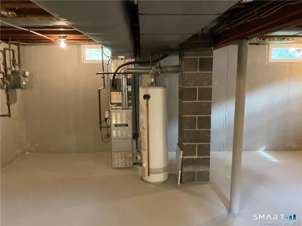 a view of an empty room with empty shelves