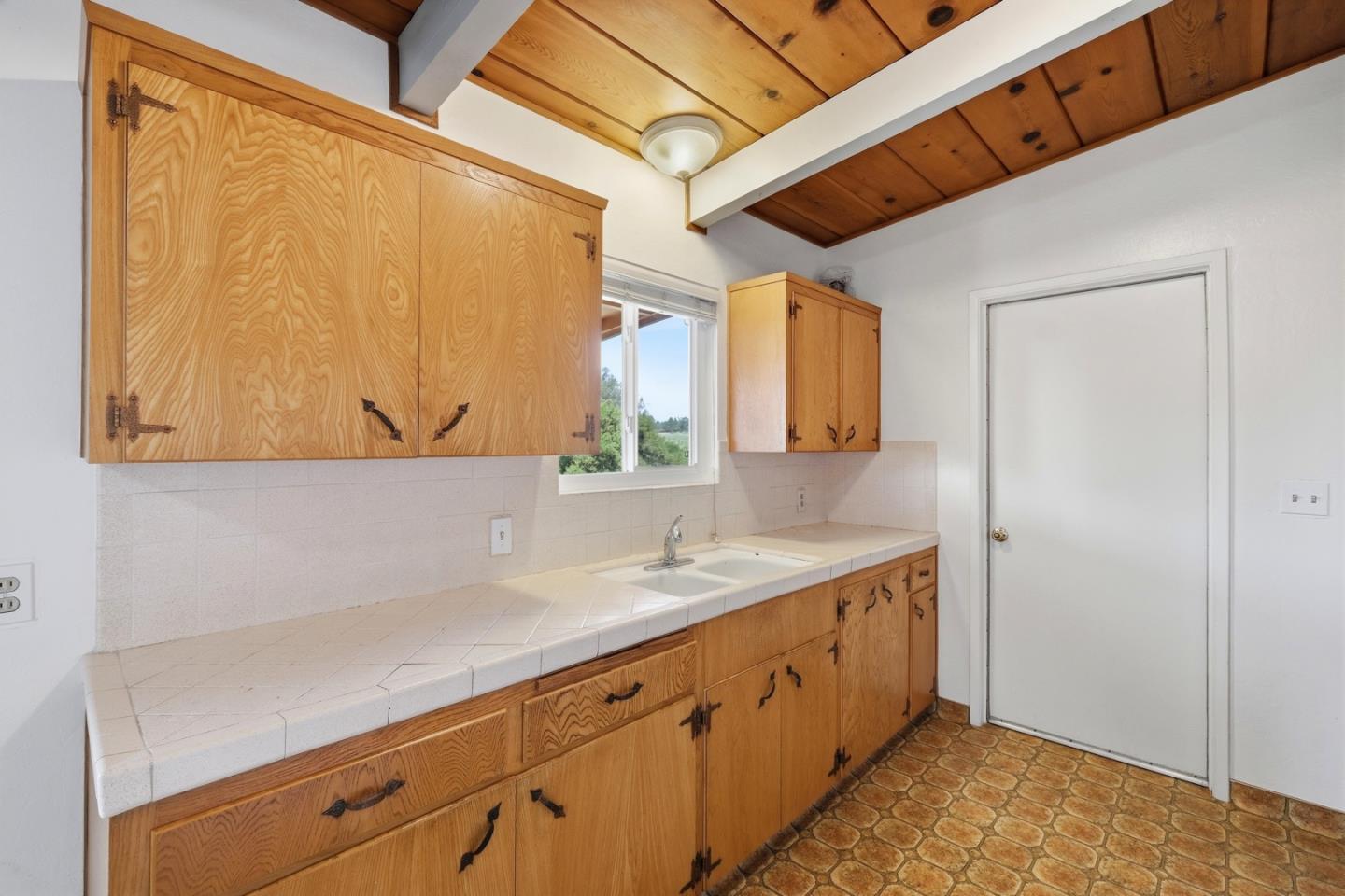 215 Manfre Road Watsonville, CA 95076 - Photo 10 of 36 a bathroom with a sink and a mirror