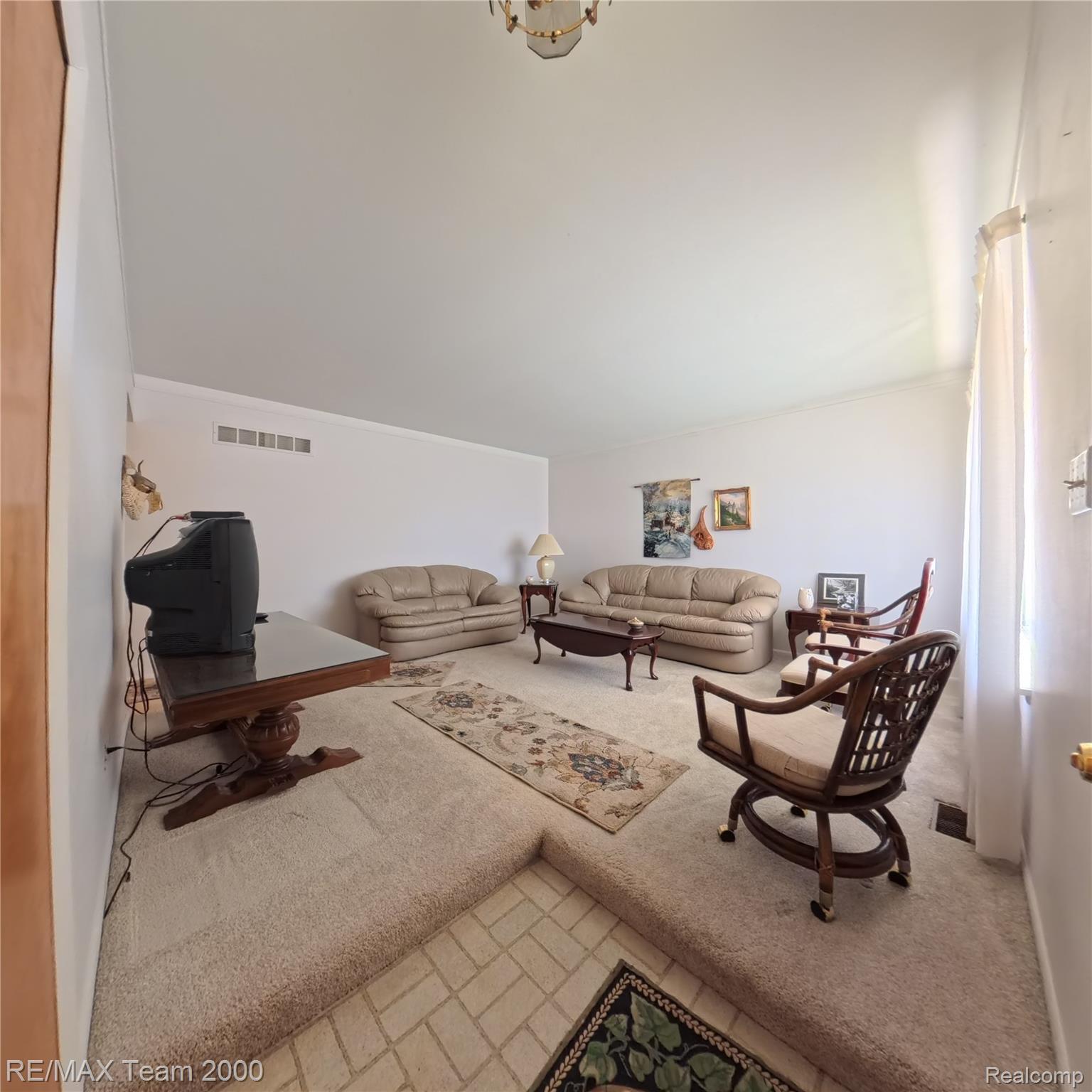 2104 Whittier Road Ypsilanti, MI 48197 - Photo 11 of 45 Living room featuring light colored carpet