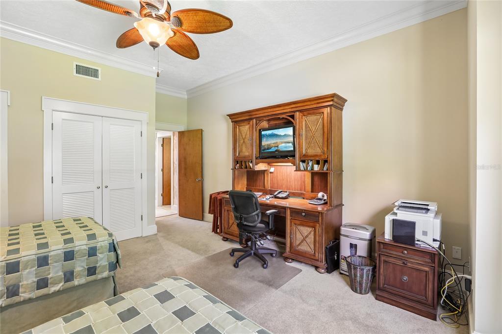 17810 Crawley Road Odessa, FL 33556 - Photo 29 of 76 a view of a livingroom with workspace and a window
