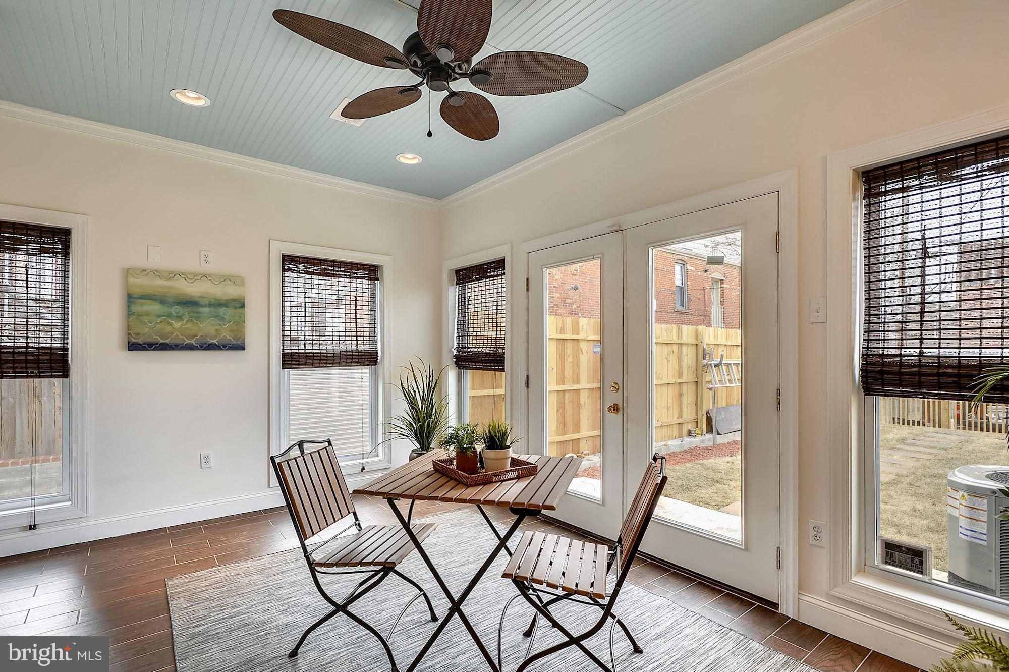 818 12th Street Northeast Washington, DC 20002 - Photo 12 of 29 a view of a dining room with furniture window and wooden floor