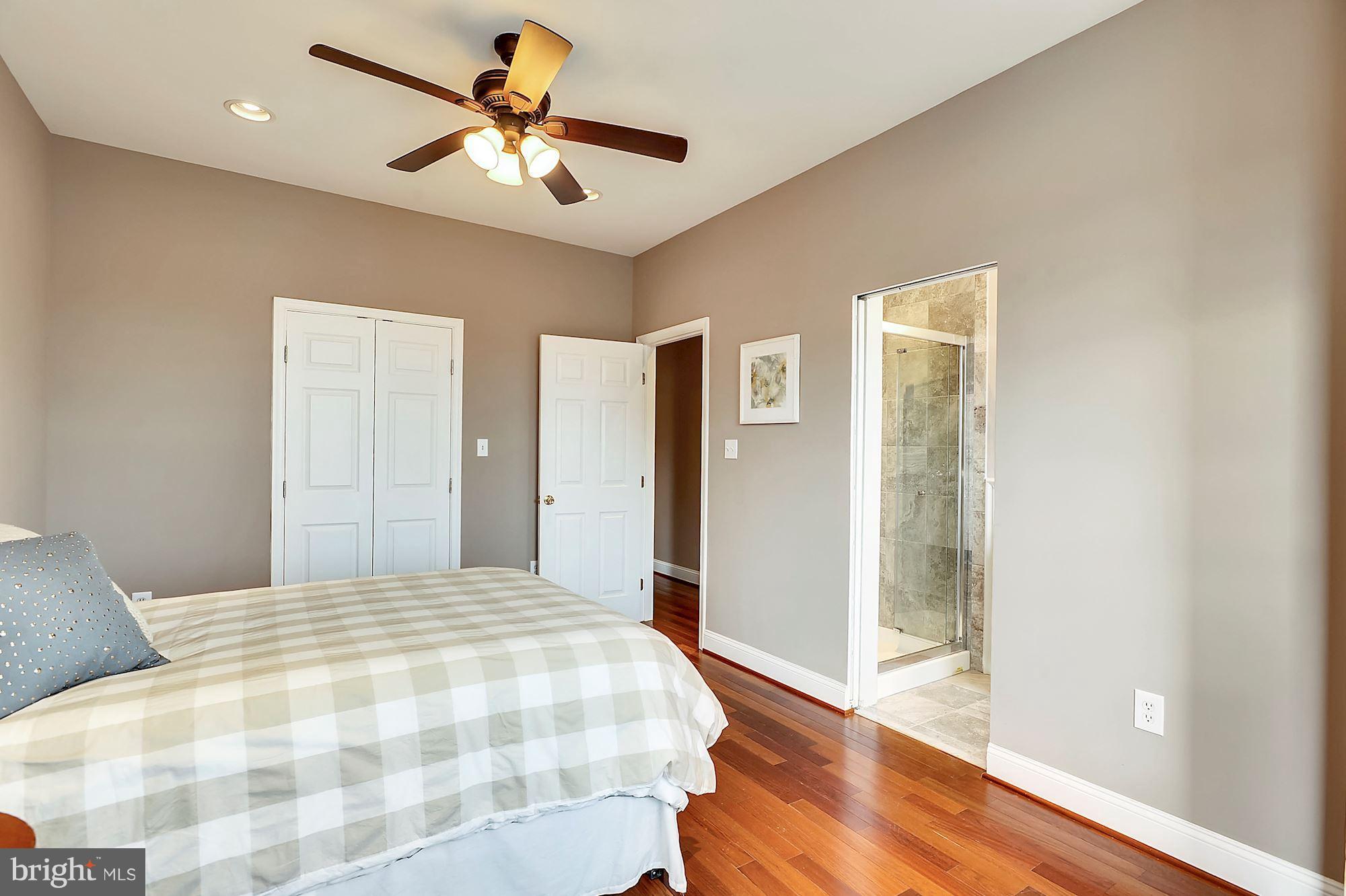 818 12th Street Northeast Washington, DC 20002 - Photo 18 of 29 a bedroom with a bed and a walk in closet