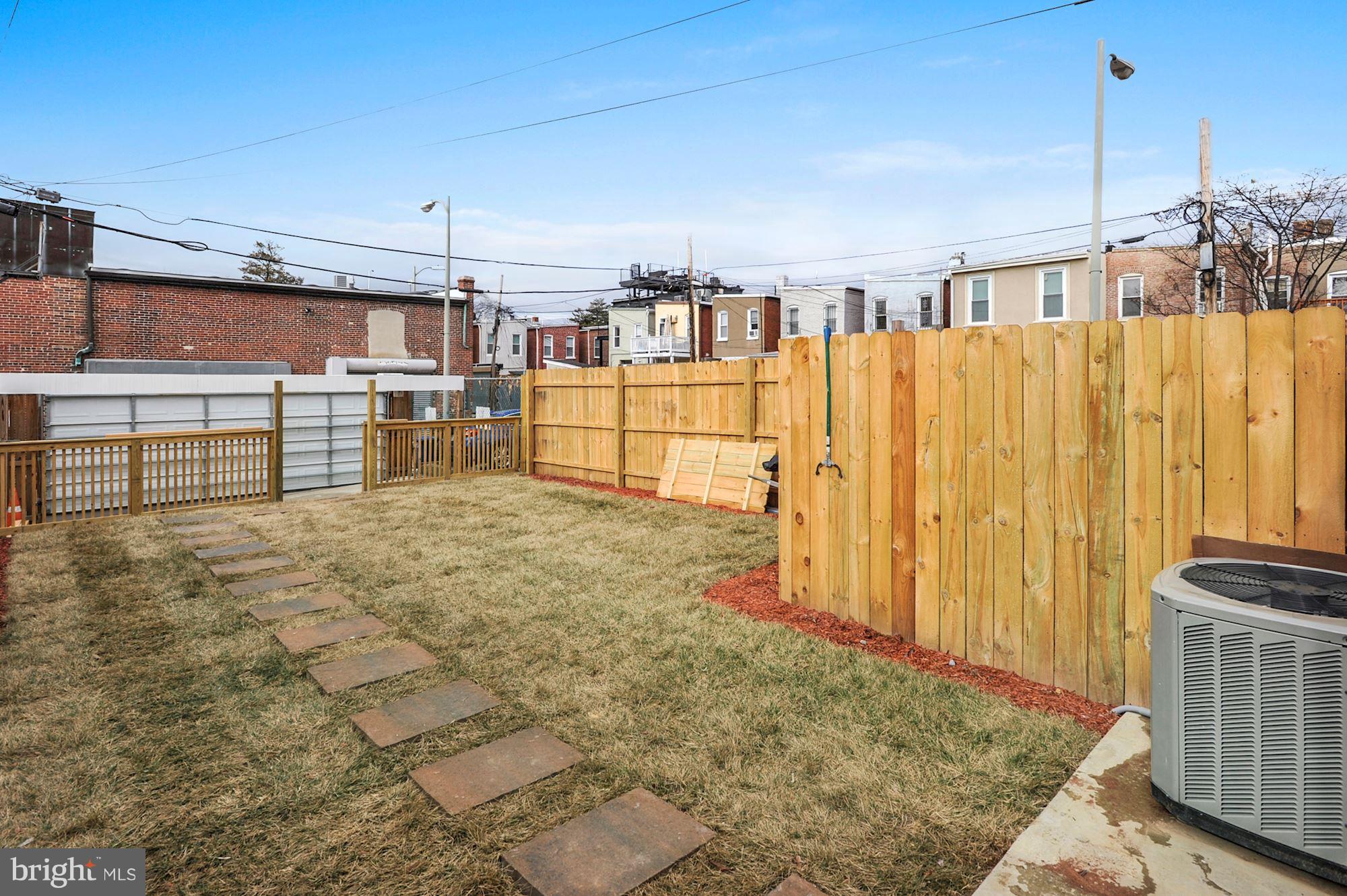 818 12th Street Northeast Washington, DC 20002 - Photo 24 of 29 a view of a chairs and table in a backyard