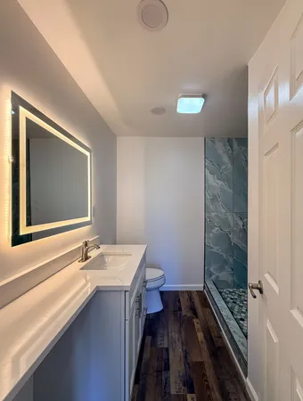 a view of a hallway with washer and dryer