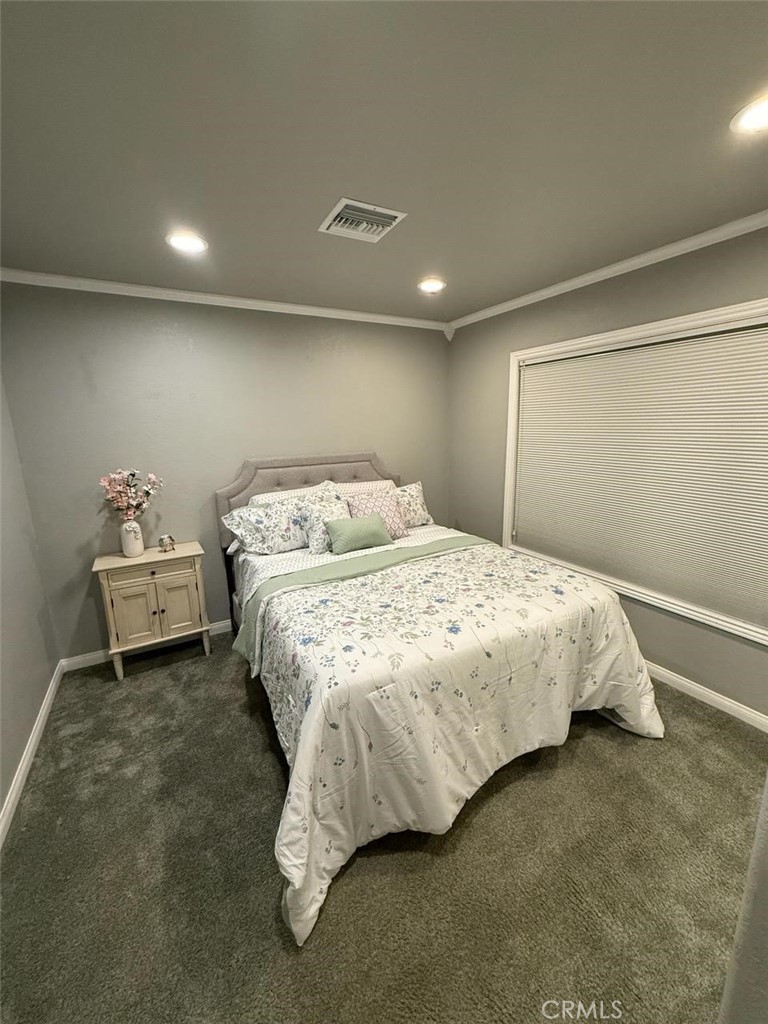 24 Edgebrook Drive Phillips Ranch, CA 91766 - Photo 24 of 75 a bedroom with a bed and a window