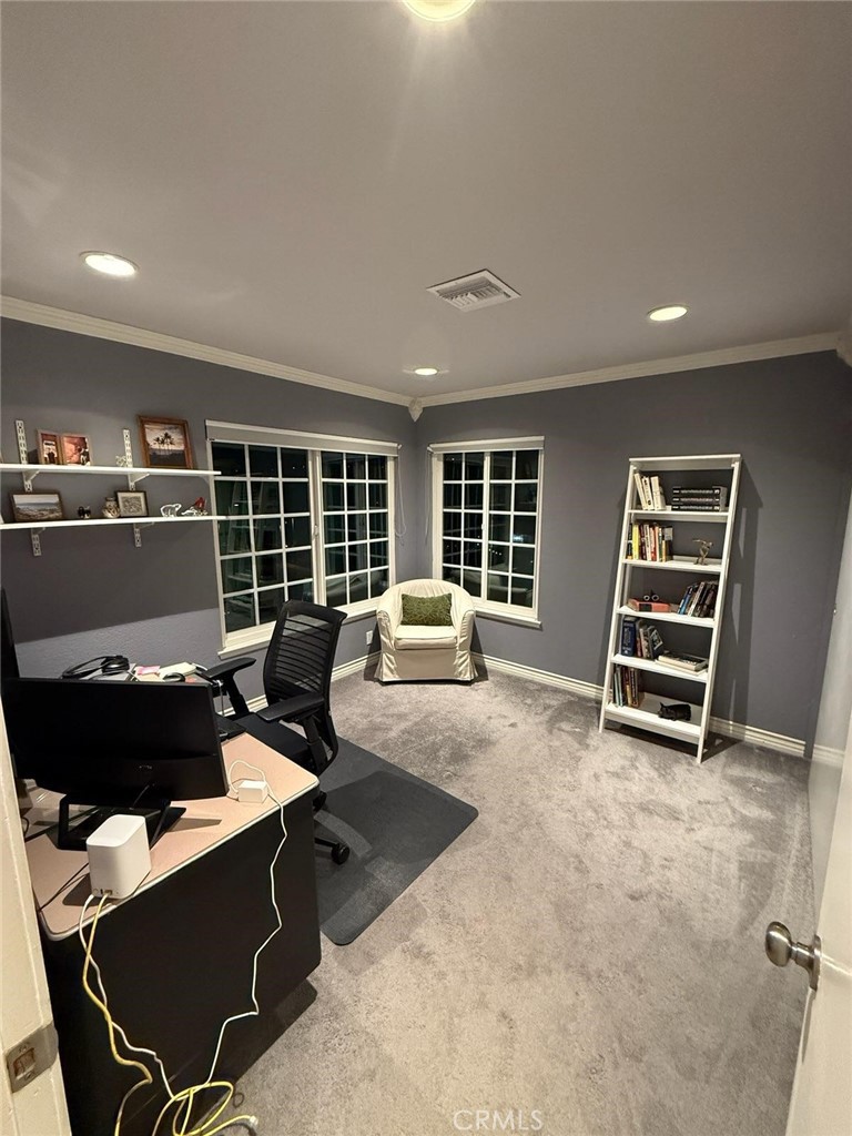24 Edgebrook Drive Phillips Ranch, CA 91766 - Photo 25 of 75 a living room with furniture and a window