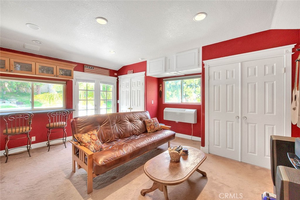 24 Edgebrook Drive Phillips Ranch, CA 91766 - Photo 31 of 75 a living room with furniture and a window