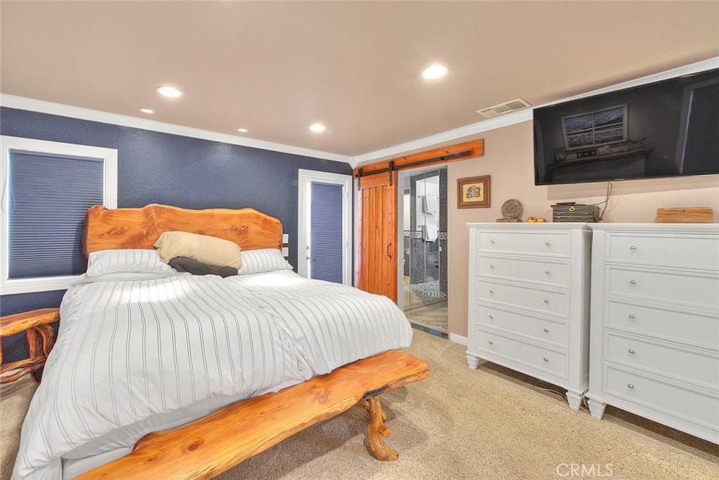 24 Edgebrook Drive Phillips Ranch, CA 91766 - Photo 41 of 75 a bedroom with a bed and a flat screen tv