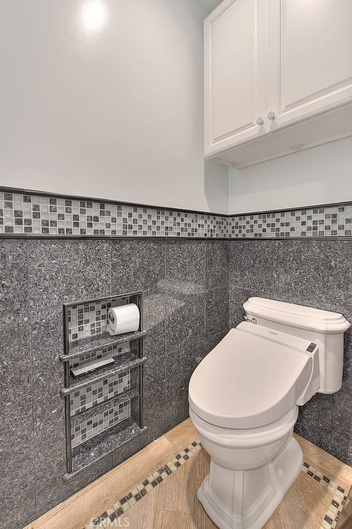 24 Edgebrook Drive Phillips Ranch, CA 91766 - Photo 48 of 75 a bathroom with a toilet and a sink