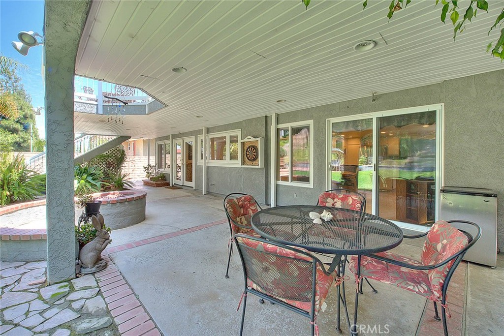 24 Edgebrook Drive Phillips Ranch, CA 91766 - Photo 51 of 75 a outdoor dining space with furniture and garden