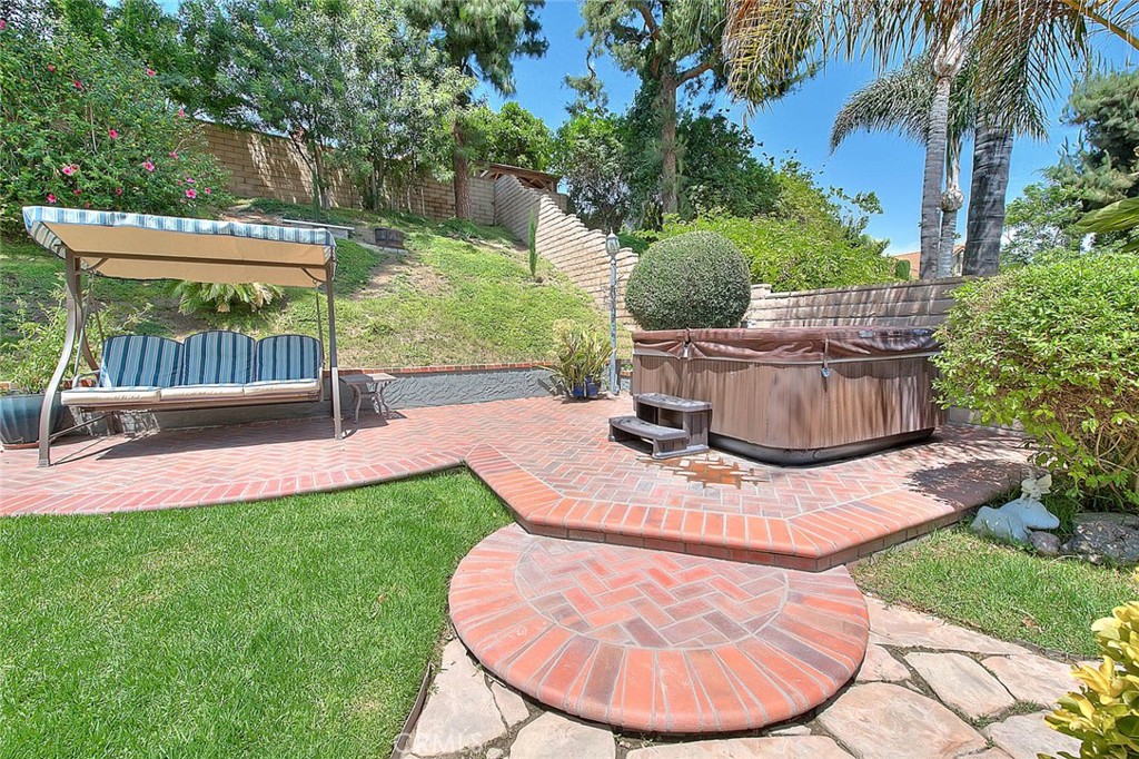 24 Edgebrook Drive Phillips Ranch, CA 91766 - Photo 59 of 75 a view of a swimming pool with a sitting space