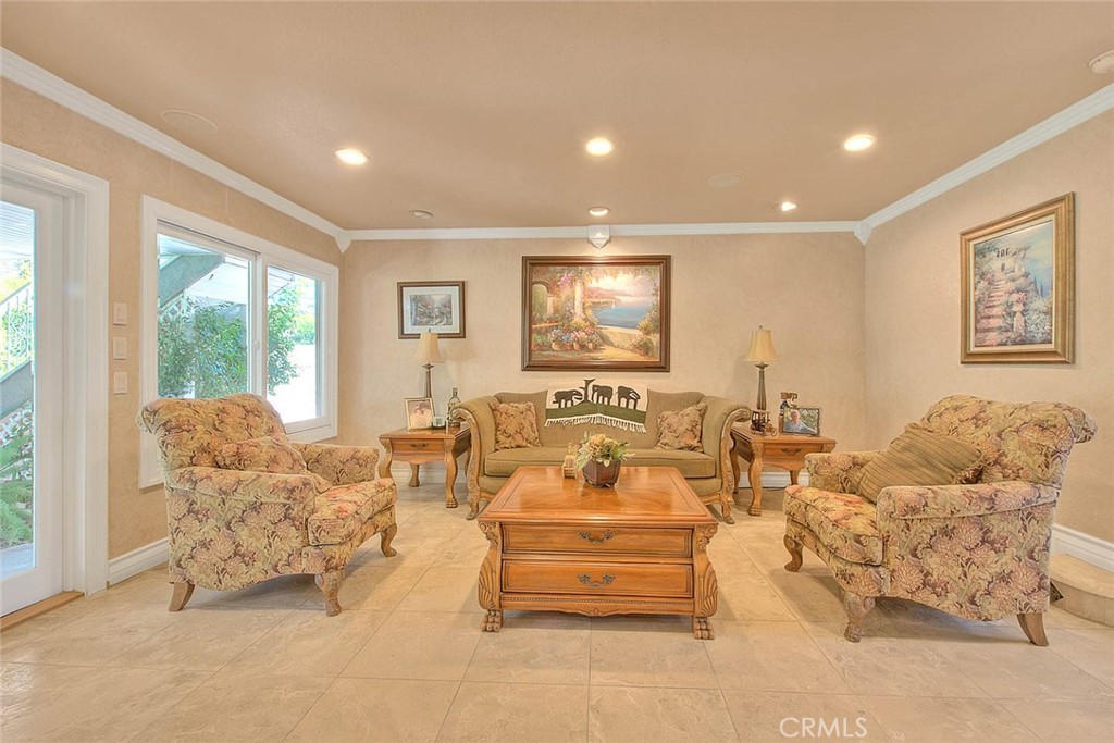 24 Edgebrook Drive Phillips Ranch, CA 91766 - Photo 7 of 75 a living room with furniture and a large window