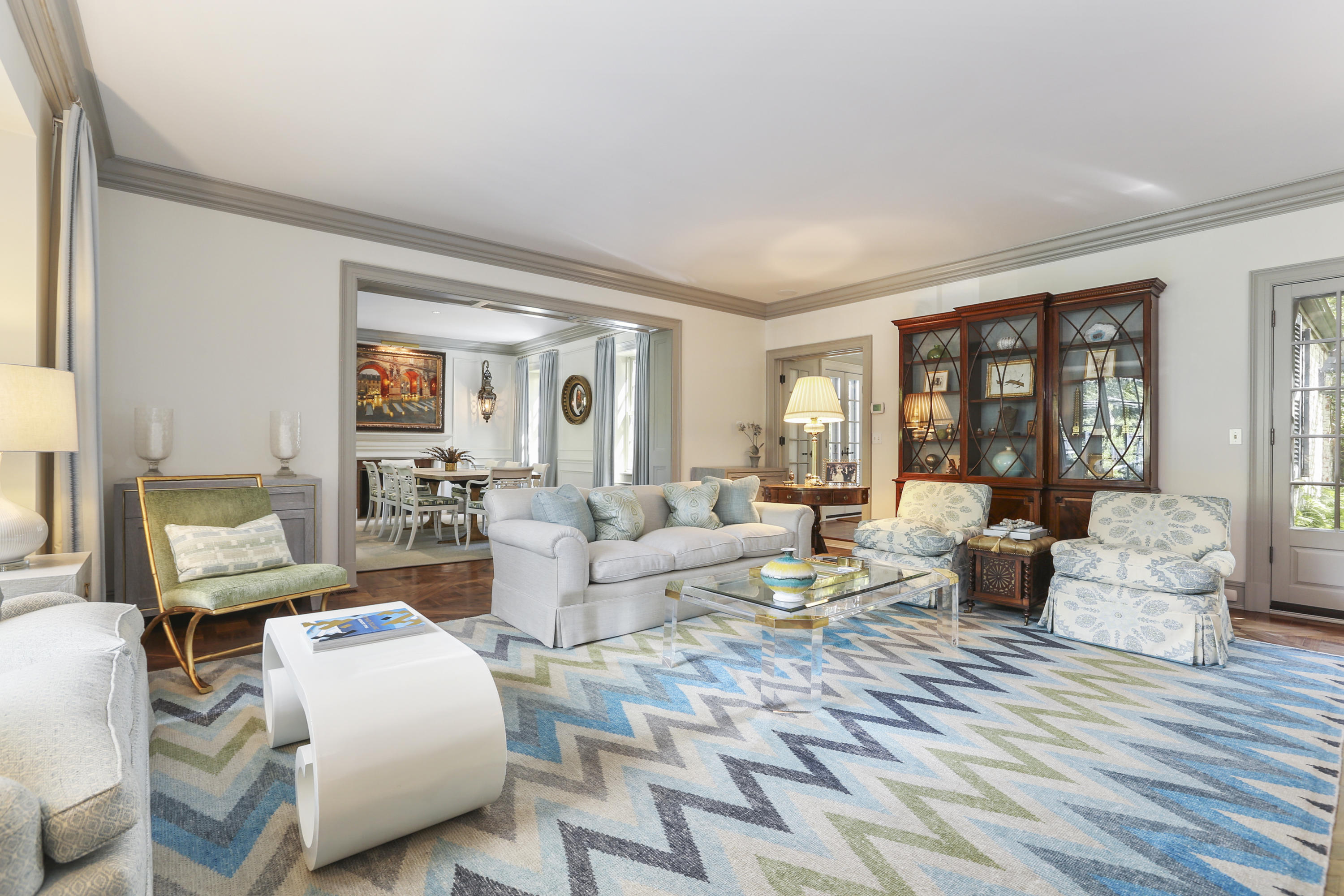29 Sunswyck Road Darien, CT 06820 - Photo 11 of 59 a living room with furniture and large windows