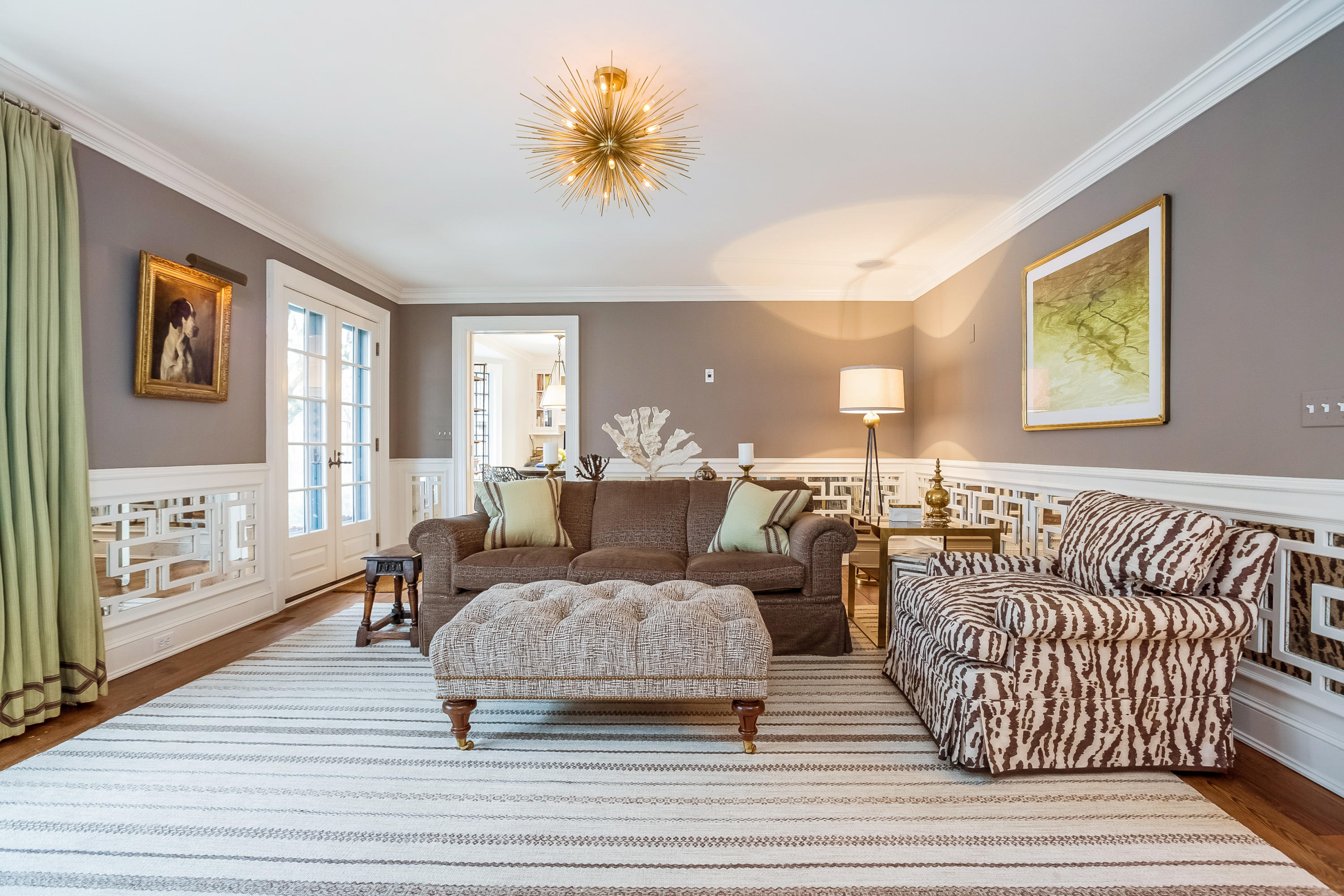 29 Sunswyck Road Darien, CT 06820 - Photo 15 of 59 a living room with furniture and painting on the wall with wooden floor