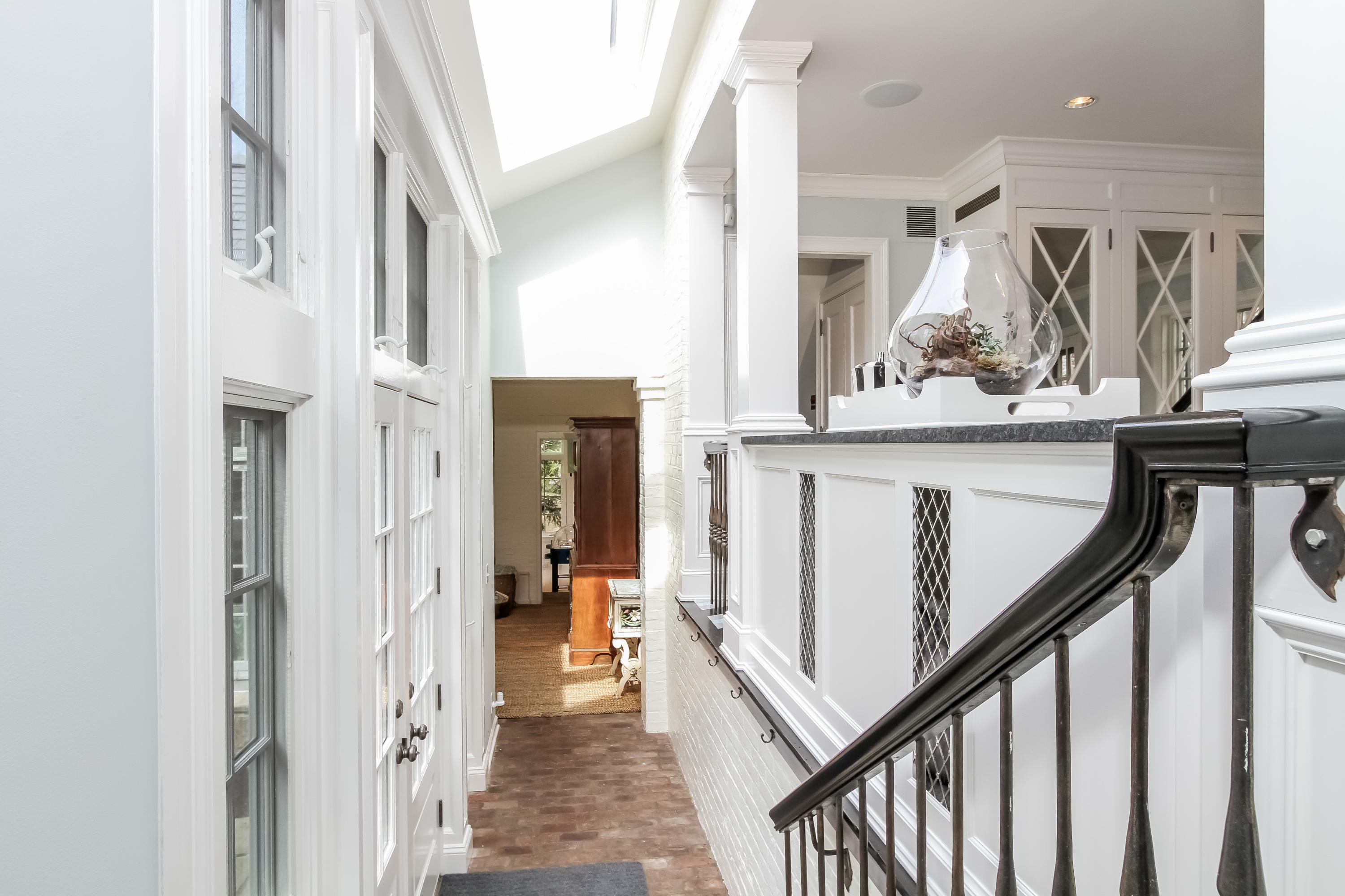 29 Sunswyck Road Darien, CT 06820 - Photo 21 of 59 a view of a hallway with wooden floor and staircase