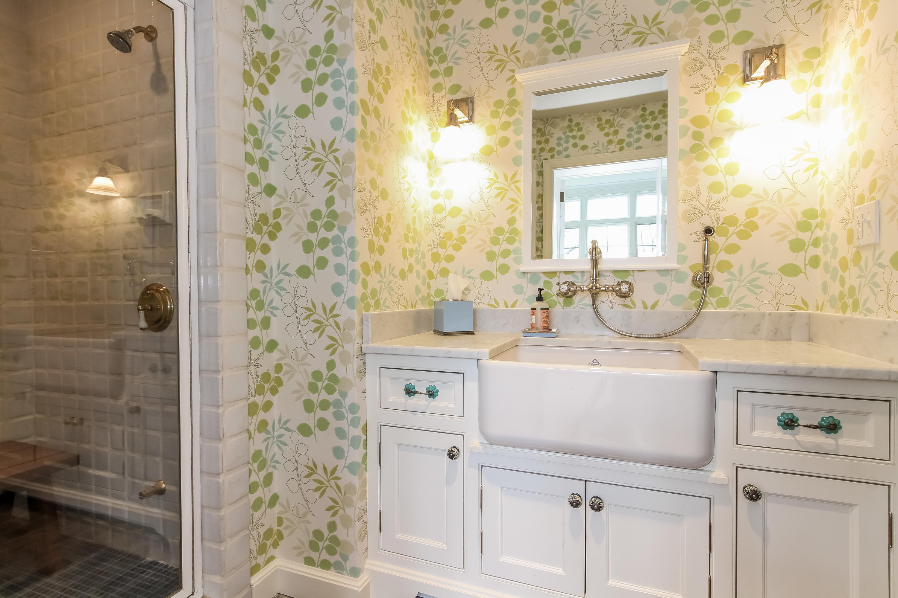 29 Sunswyck Road Darien, CT 06820 - Photo 27 of 59 a bathroom with a sink a vanity and a mirror