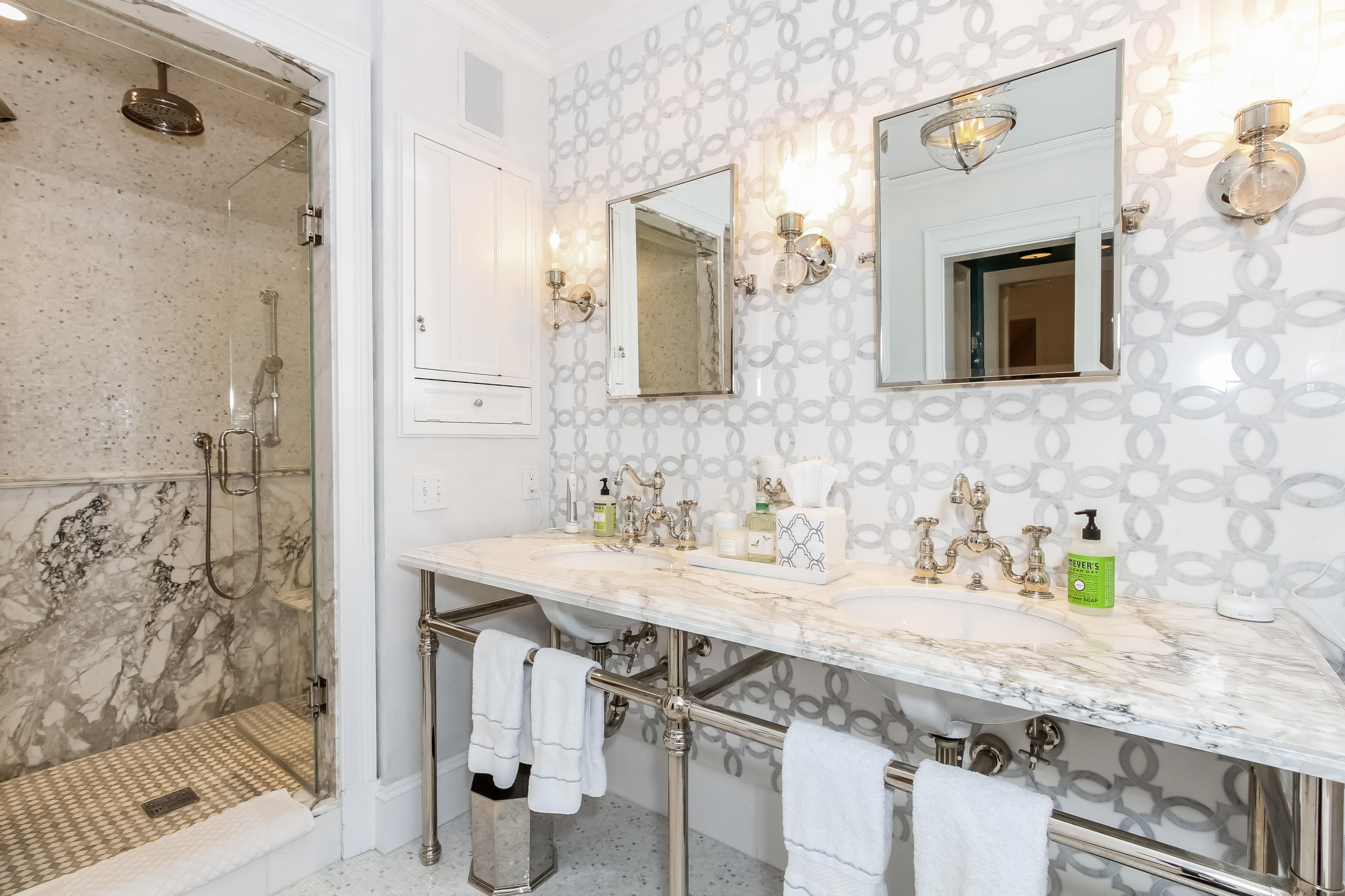 29 Sunswyck Road Darien, CT 06820 - Photo 34 of 59 a bathroom with a granite countertop sink a mirror and shower