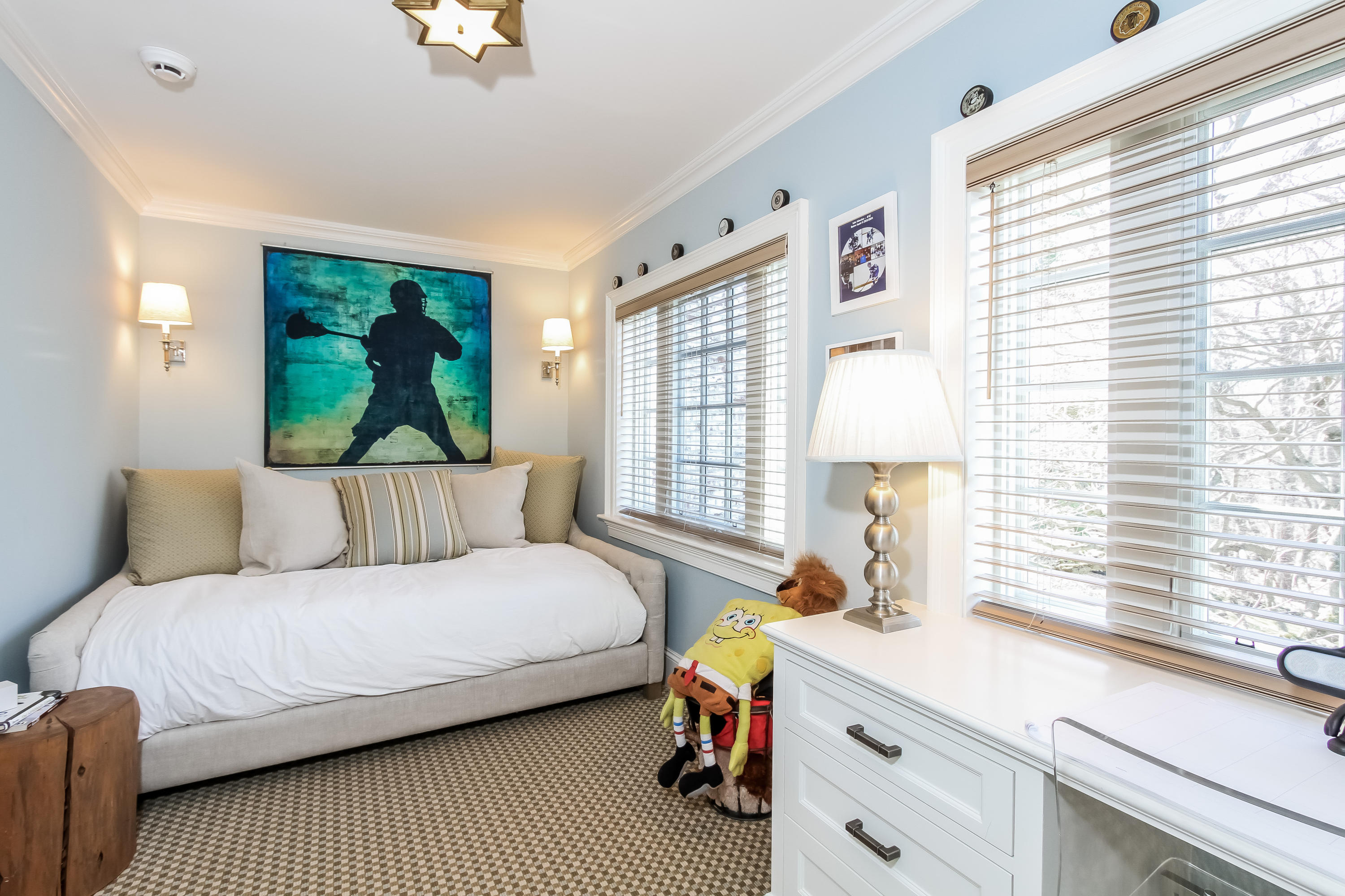 29 Sunswyck Road Darien, CT 06820 - Photo 39 of 59 a bedroom with a bed and a window