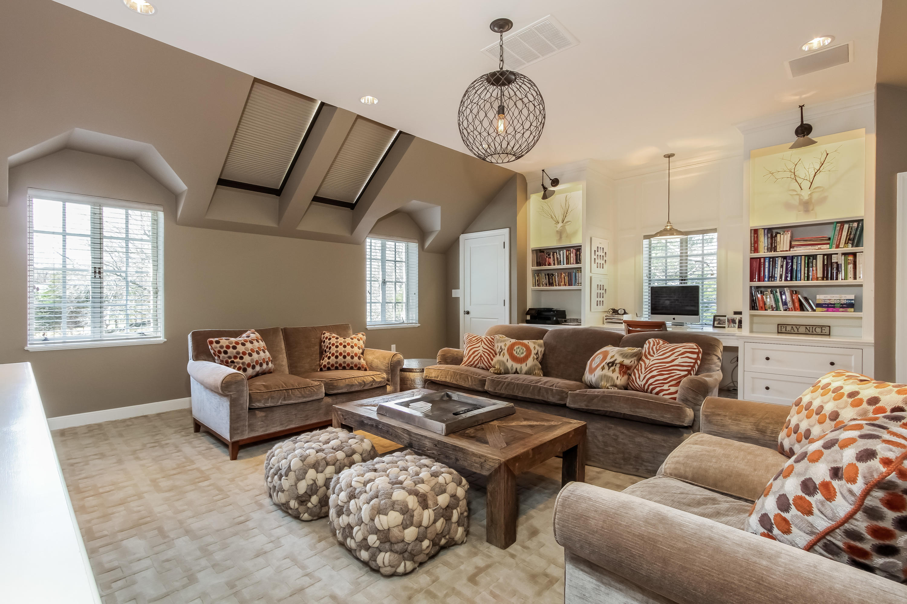 29 Sunswyck Road Darien, CT 06820 - Photo 42 of 59 a living room with furniture and a large window