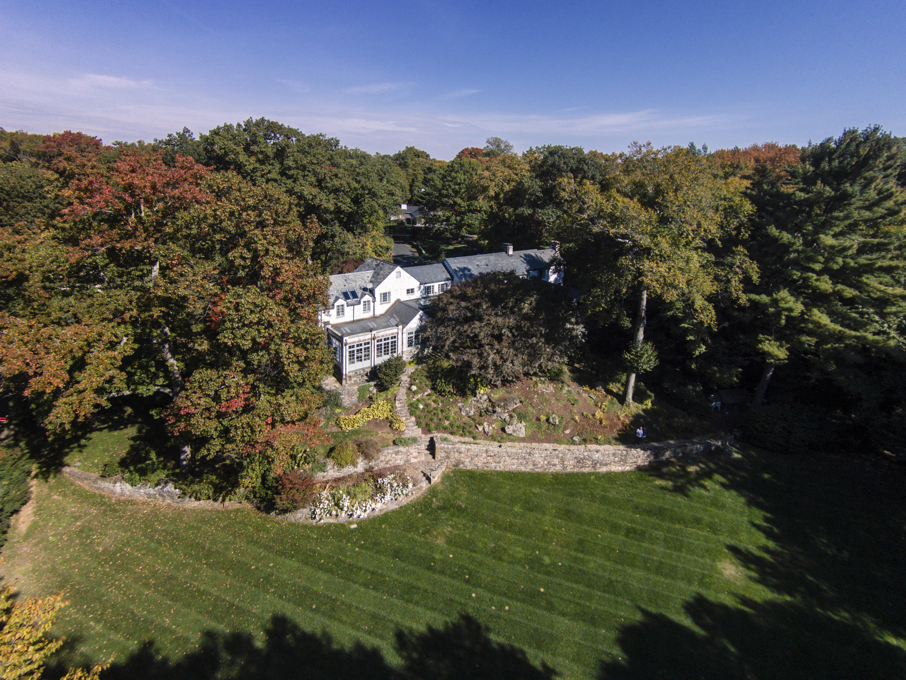 29 Sunswyck Road Darien, CT 06820 - Photo 54 of 59 a view of a house with a yard