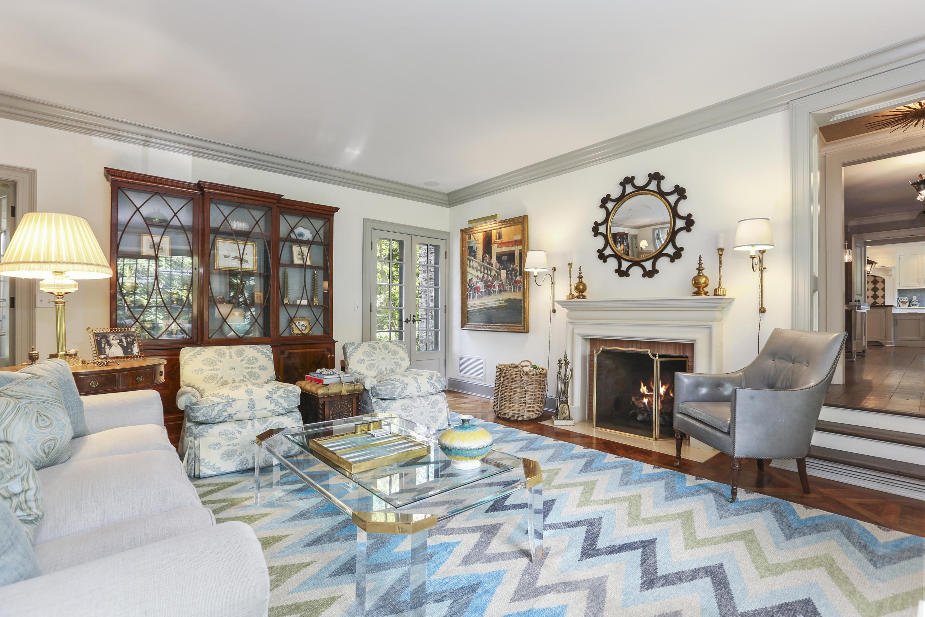 29 Sunswyck Road Darien, CT 06820 - Photo 10 of 59 a living room with furniture and a fireplace
