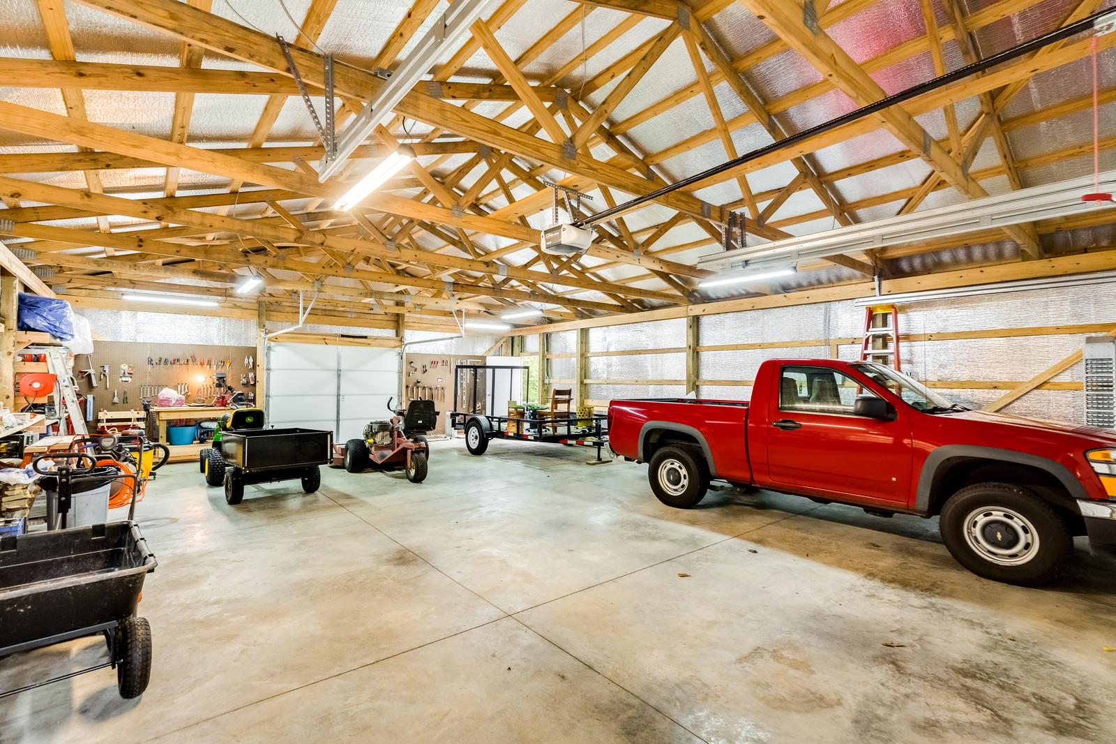 1529 Rapids Road Portland, TN 37148 - Photo 9 of 30 a view of a garage with cars parked