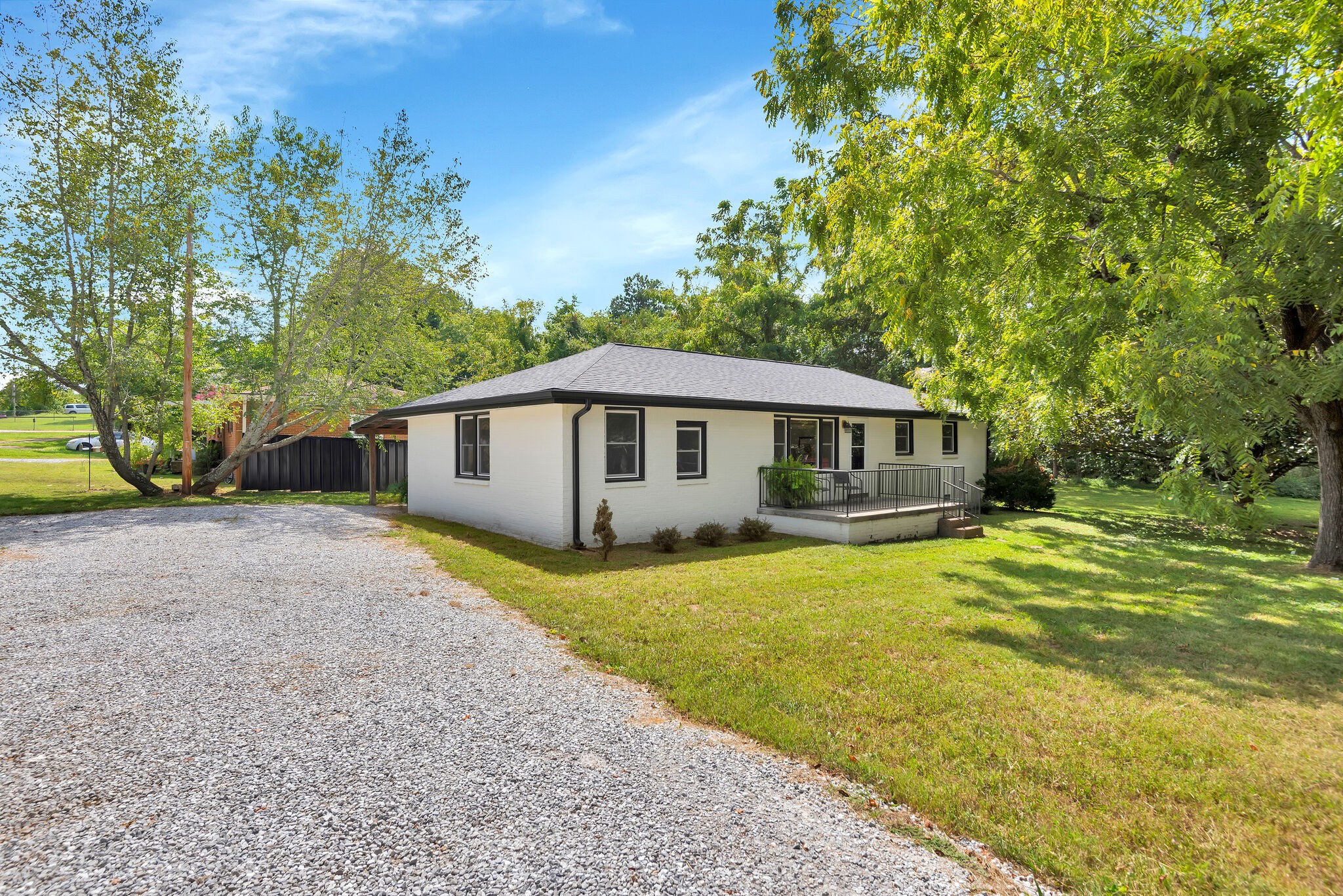 212 Pump Hill Road Dickson, TN 37055 - Photo 2 of 27 a front view of a house with garden