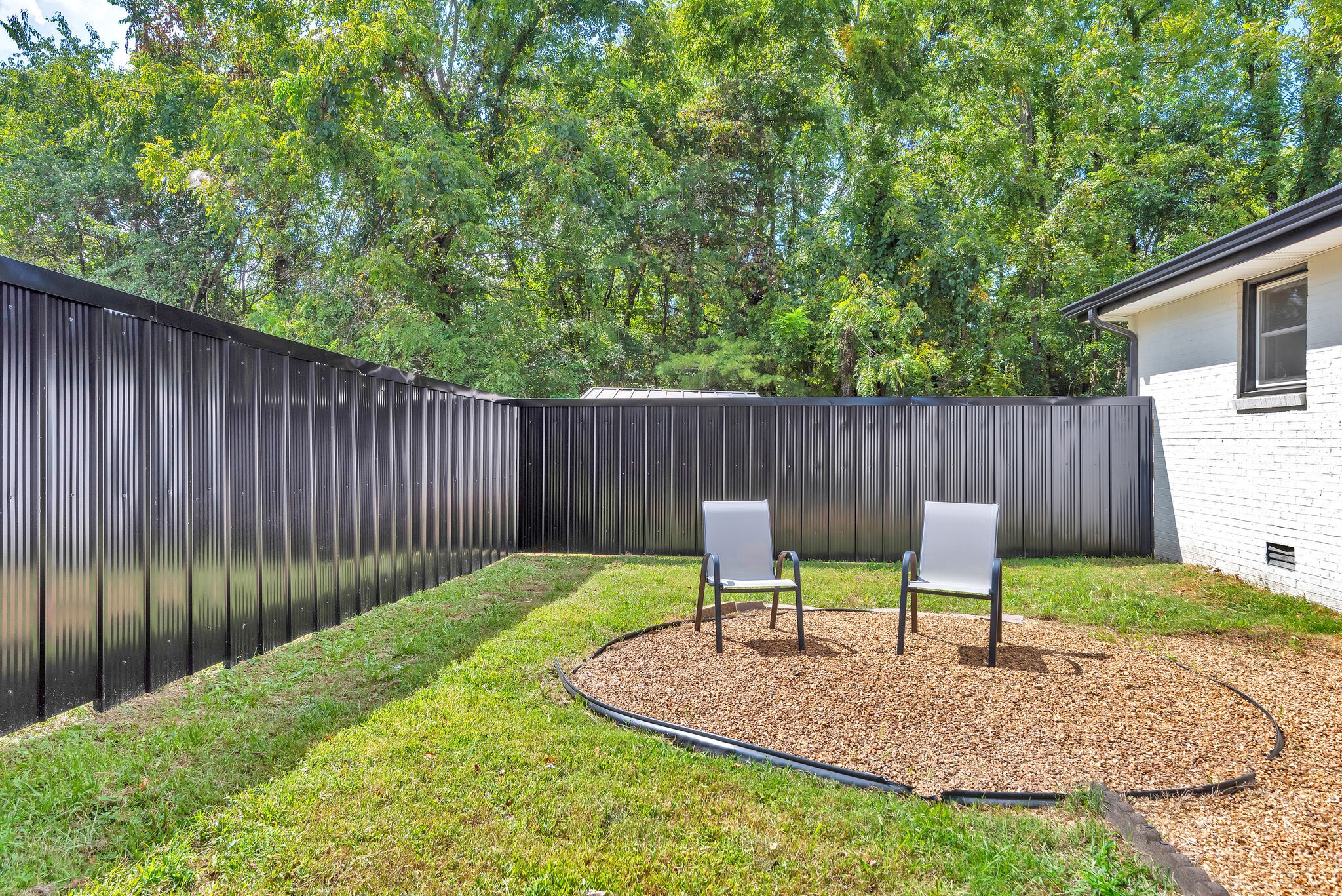 212 Pump Hill Road Dickson, TN 37055 - Photo 25 of 27 a view of table and chairs in backyard