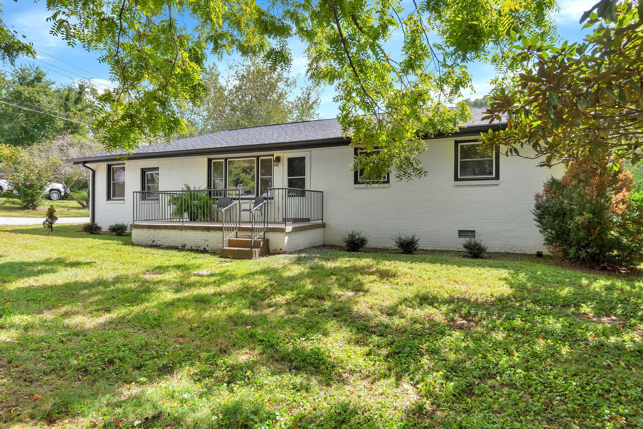 212 Pump Hill Road Dickson, TN 37055 - Photo 4 of 27 a house view with a garden space