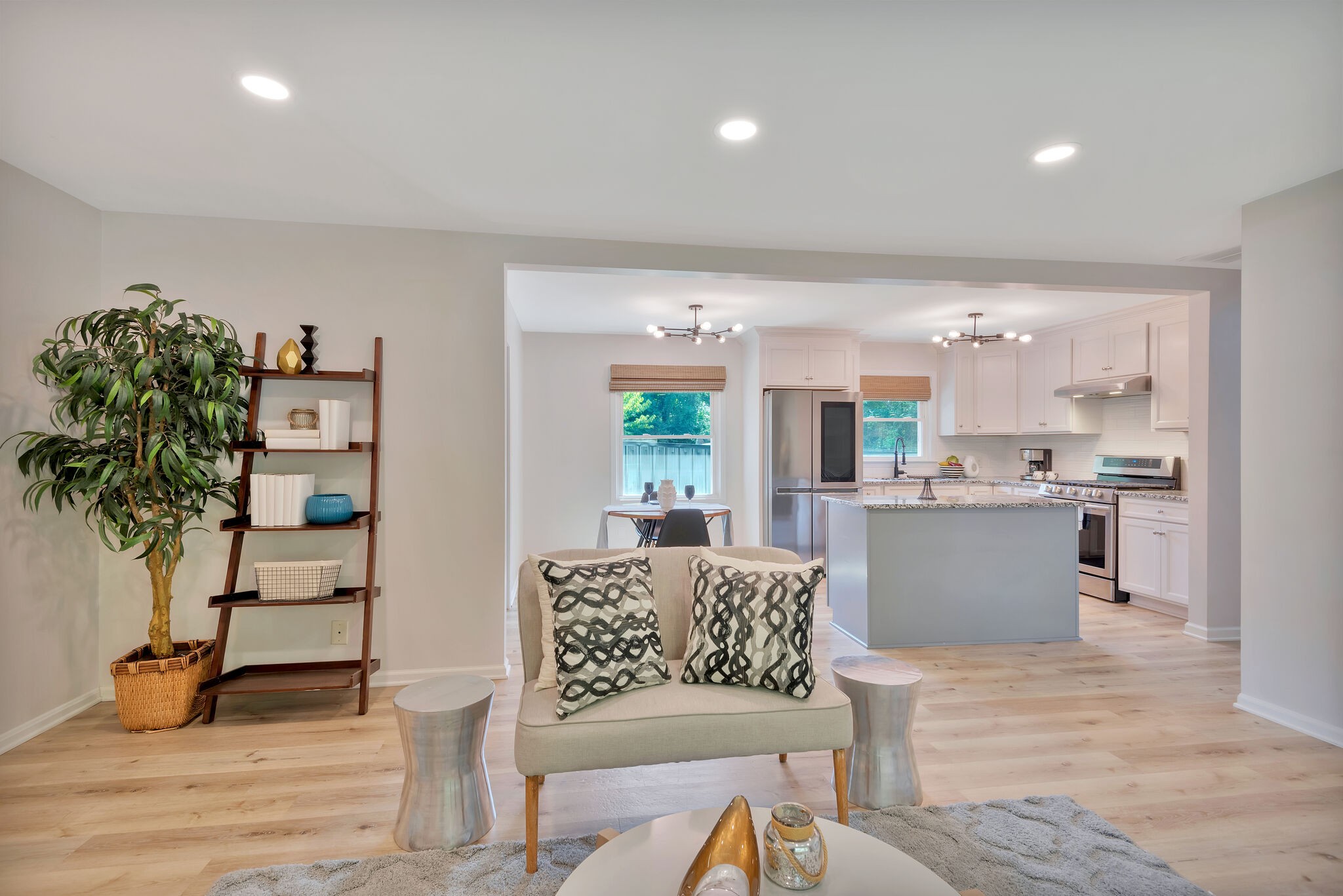 212 Pump Hill Road Dickson, TN 37055 - Photo 7 of 27 a living room with furniture potted plant and kitchen view