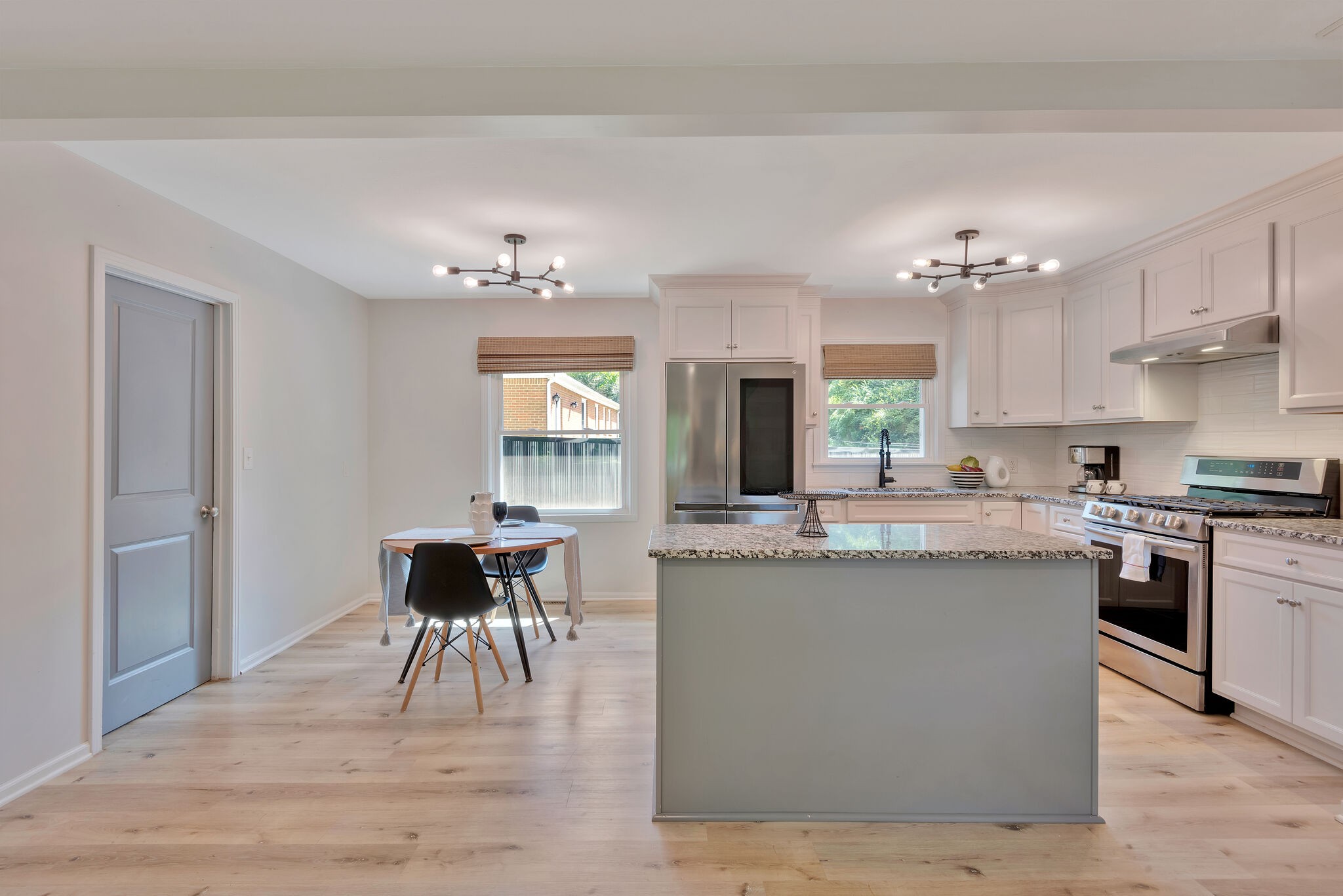 212 Pump Hill Road Dickson, TN 37055 - Photo 10 of 27 a kitchen with kitchen island granite countertop a sink cabinets and stainless steel appliances