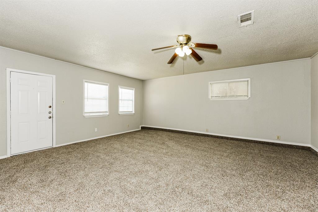 218 Long Shadow Lane Mesquite, TX 75149 - Photo 7 of 15 a view of an empty room with a window