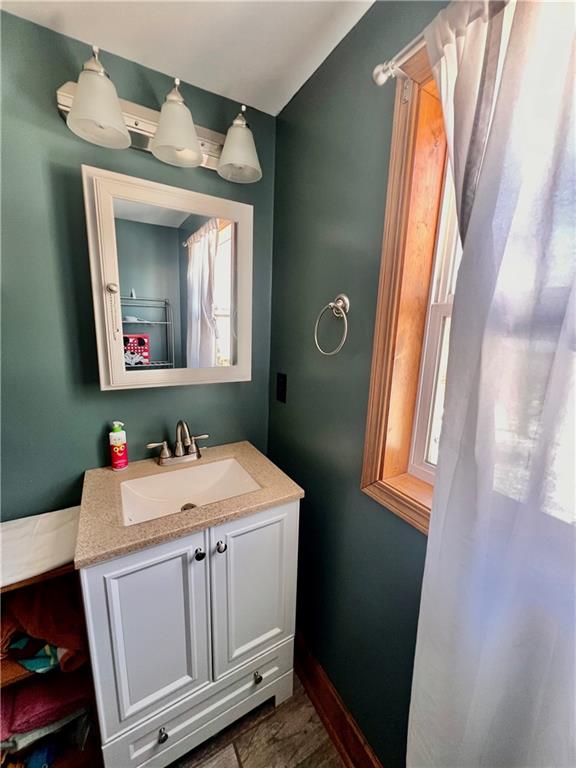 929 Mt Jackson Road New Castle, PA 16102 - Photo 15 of 21 a bathroom with a toilet sink and mirror