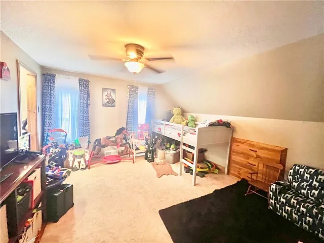 a view of a livingroom with furniture