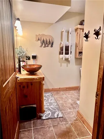 a view of a hallway with seating area