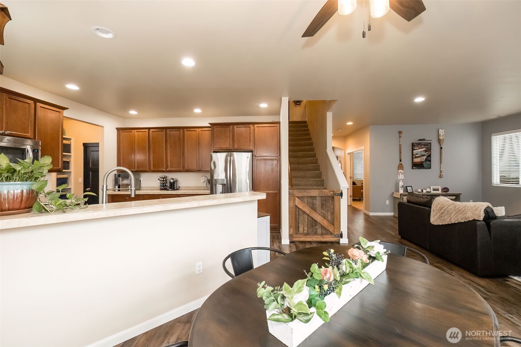 4189 Southwest Colbert Way Port Orchard, WA 98367 - Photo 11 of 38 a living room with furniture and a wooden floor